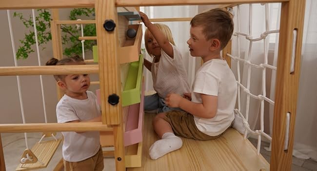 child climbing on indoor jungle gym for kids ages 1-3 and older
