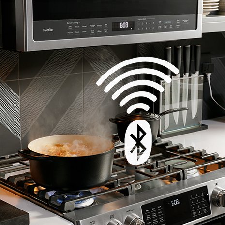 Pot cooking on stove with food steaming and Bluetooth symbol showing connection between range and microwave. Pot cooking on stove with food steaming and Bluetooth symbol showing connection between range and microwave.